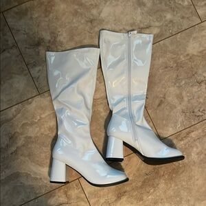 White glossy Gogo boots size 8. New in box. 3” heels.